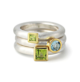 Ring "Quadrat" mit einem Peridot