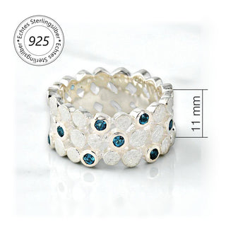 Ring "Nachtgeheimnis" mit Topas London blue