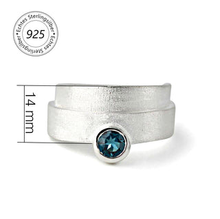 Ring "Glücksspirale" mit Topas london blue