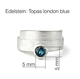 Ring "Glücksspirale" mit Topas london blue
